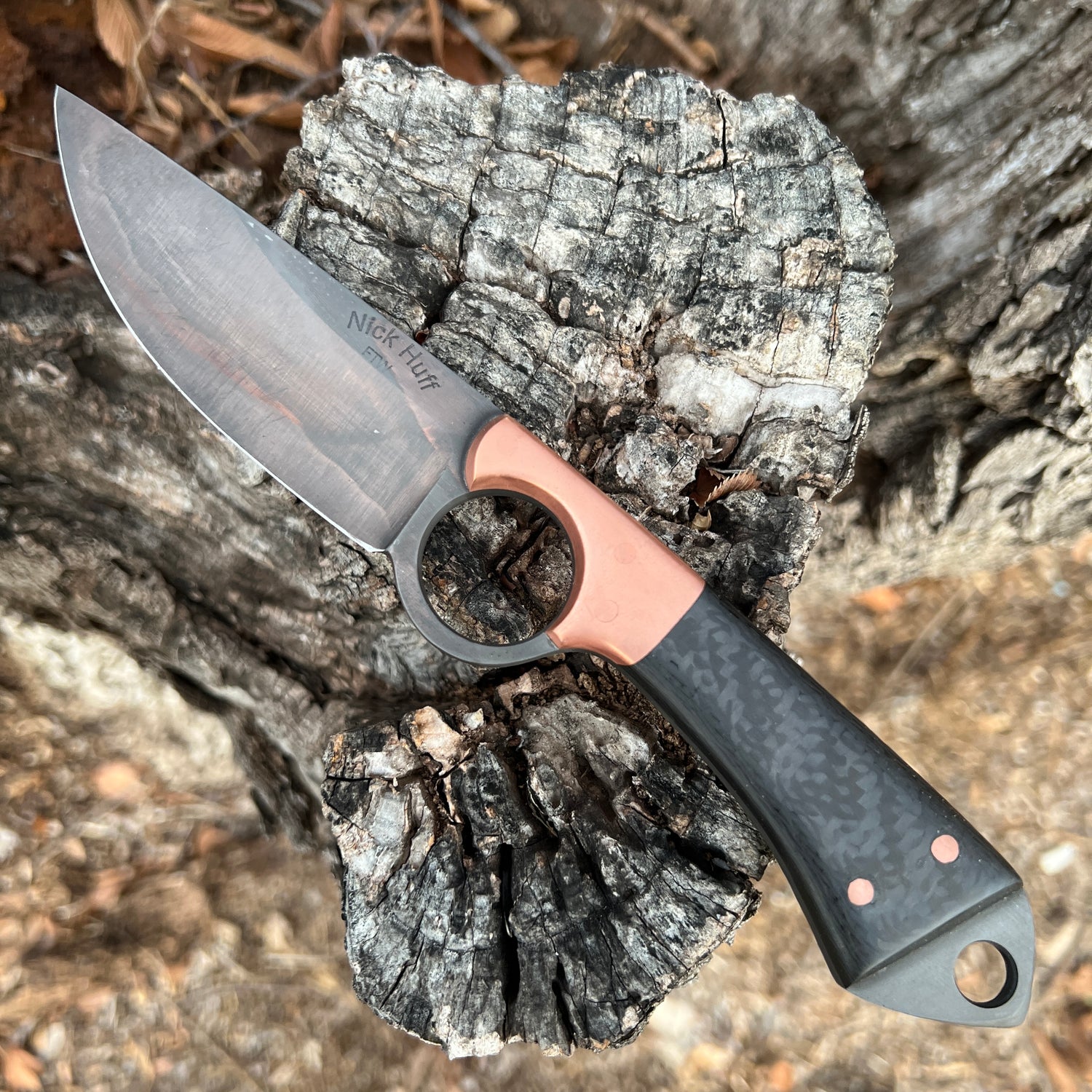 Texas Tornado 1095 steel, differential quench, bolsters and handle. Comes with a leather sheath.